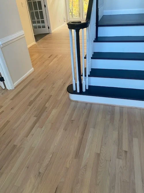 Photo of a newly refinished floor completed by providence hardwood flooring