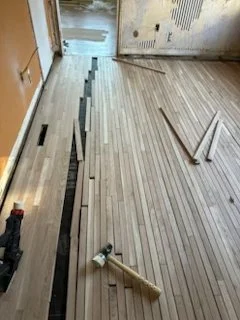 Photo of an engineered floor installation