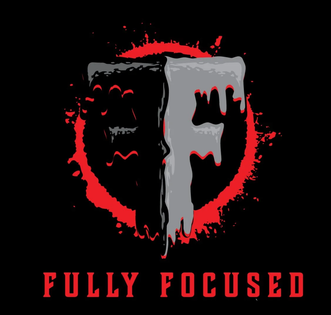 Graphic logo of a half skull and half axe with red splatters and the text 'FULLY FOCUSED' underneath.