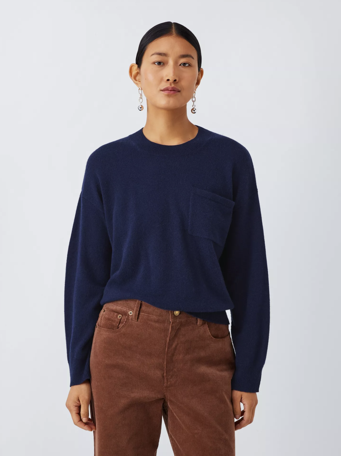 John Lewis — Crew Neck Cashmere Patch Pocket Jumper
Made from 100% Sustainable Fibre Alliance–certified cashmere, this jumper has a relaxed, boxy fit in a lighter-weight knit. A higher neckline and subtle patch pocket add character, while the soft ha