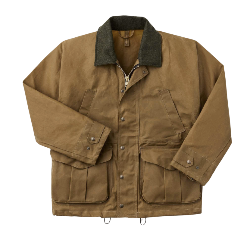 Filson — Tin Cloth Field Jacket
Crafted from Filson’s oil-finished Tin Cloth with seamless shoulders, wool-lined collar and pockets, and generous field-inspired storage. Rugged and comfortable in equal measure.