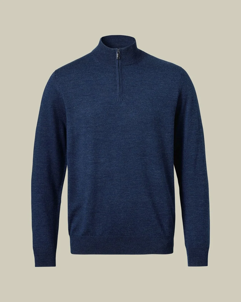 Charles Tyrwhitt — Pure Merino Half Zip Jumper. Merino is nature’s performance fabric: breathable, temperature regulating, and naturally soft. Gently washed for an even silkier finish, this half zip has a clean, understated design with ribbed cuffs a