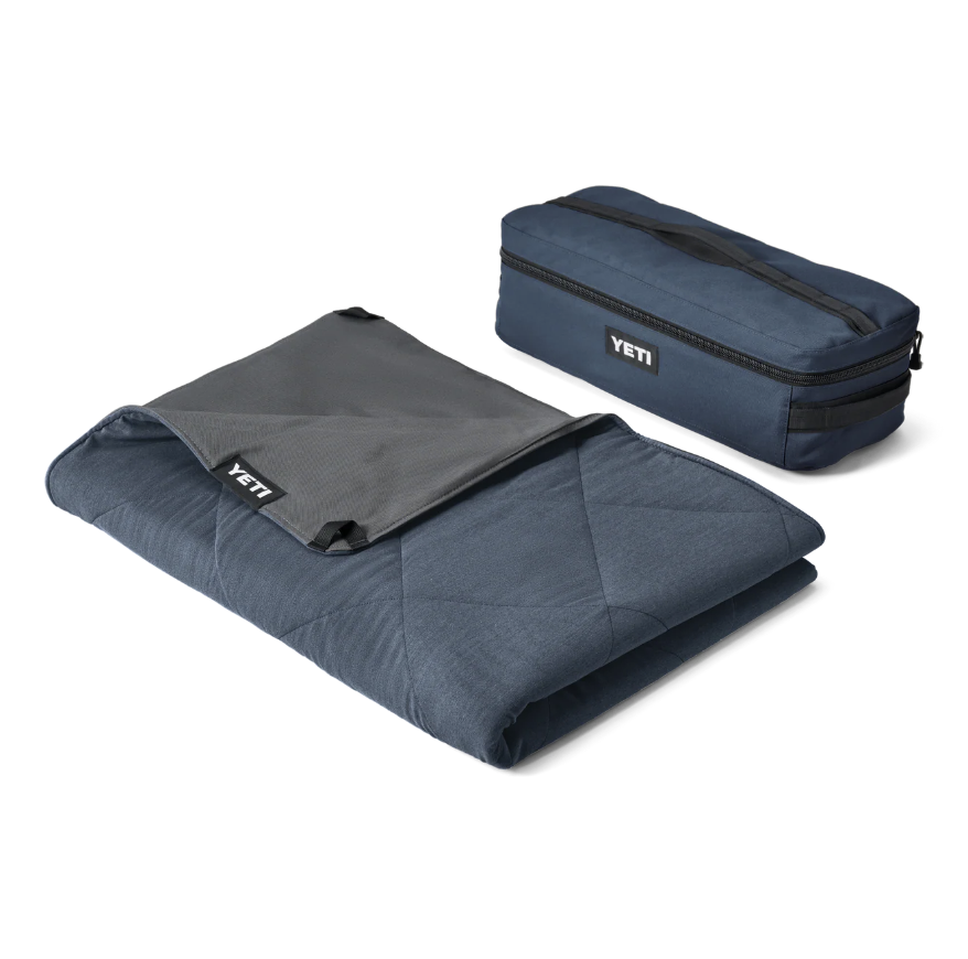 YETI - Picnic Blanket. A plush, all-terrain blanket with a waterproof HydroBarrier™ layer and pet-hair-resistant fabric. Comfortable, rugged, and ready for any outdoor moment.