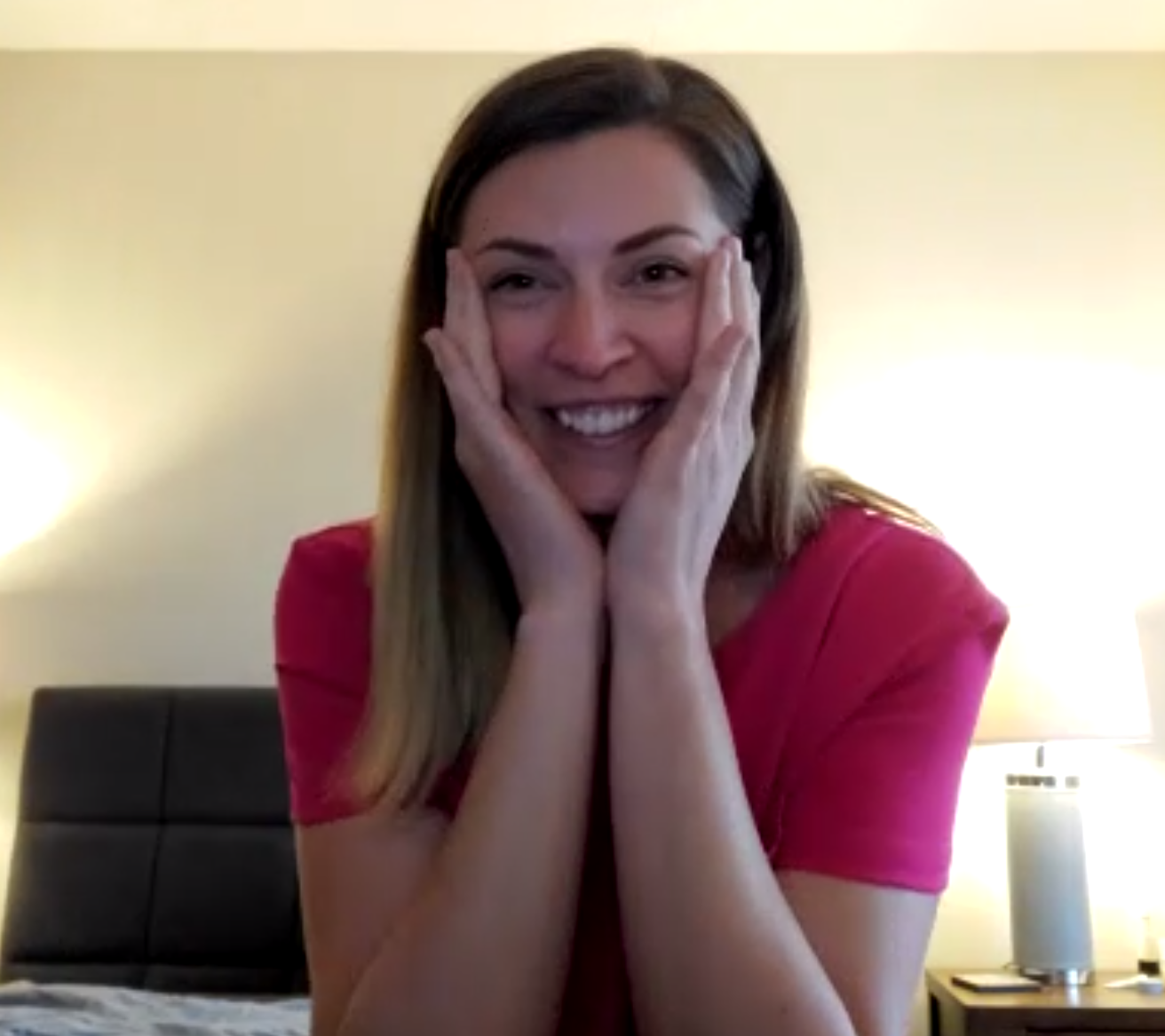 Kerri Quigley reacts to winning the WEALF Visionary Award with an expression of joy and hands on her face