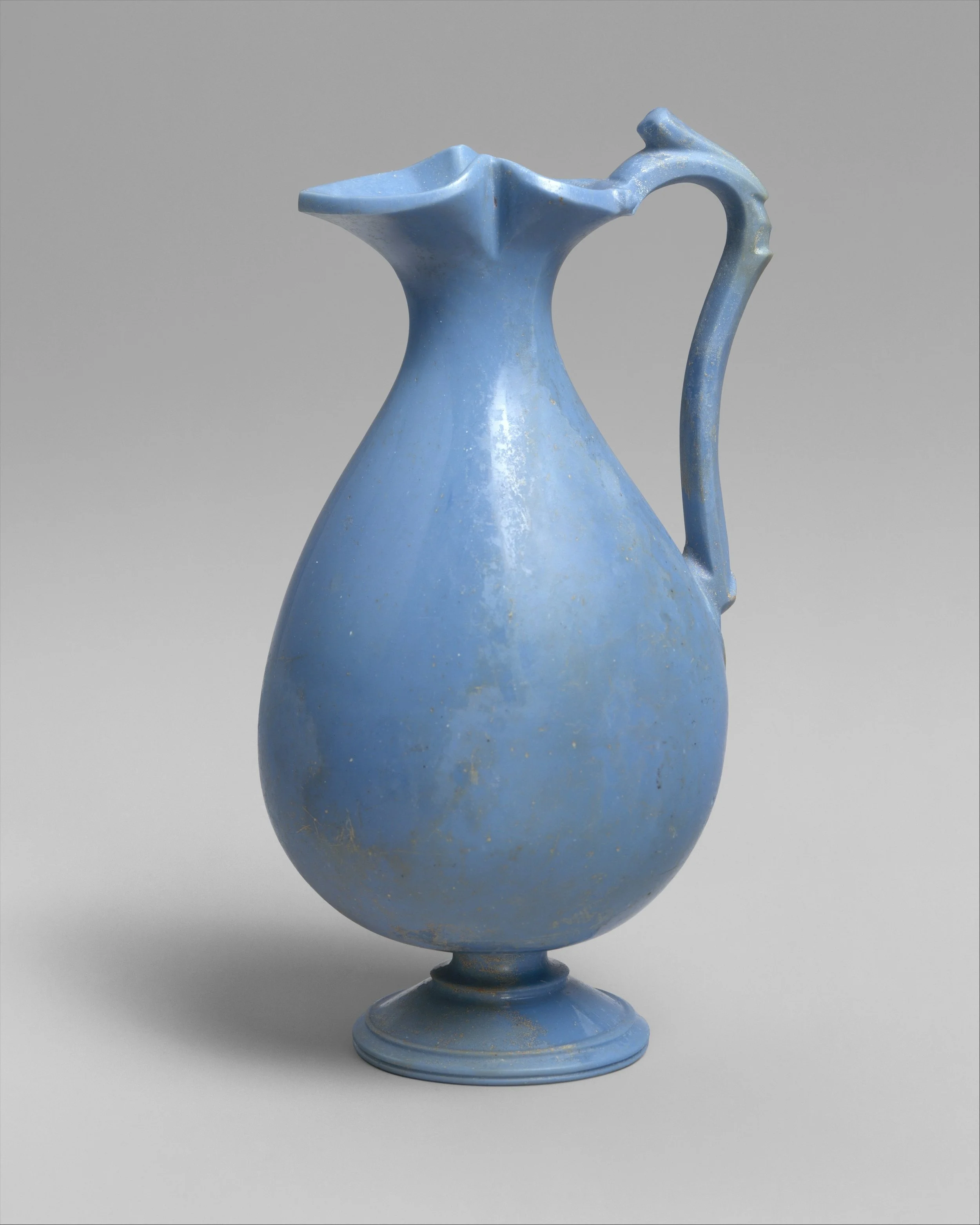 A blue ceramic jug