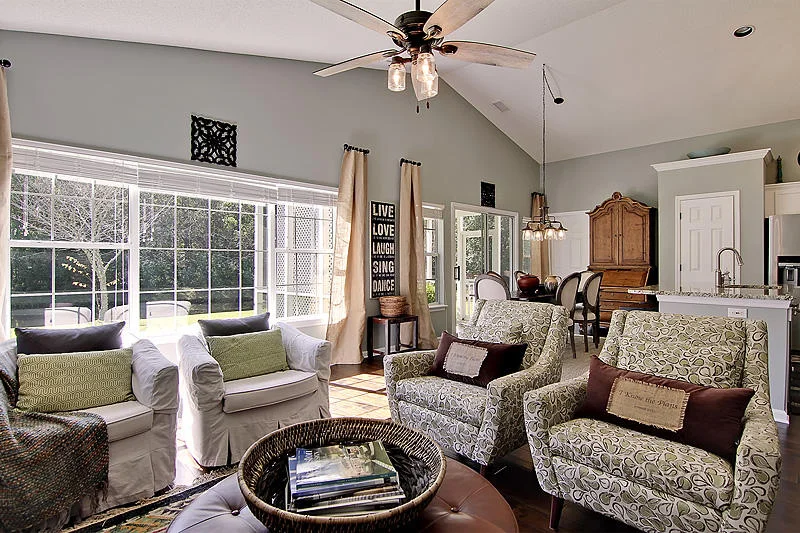 Great Room AFTER the remodel. Updated with the pond view enhanced and the feeling of bringing the outside in with the new paint color.