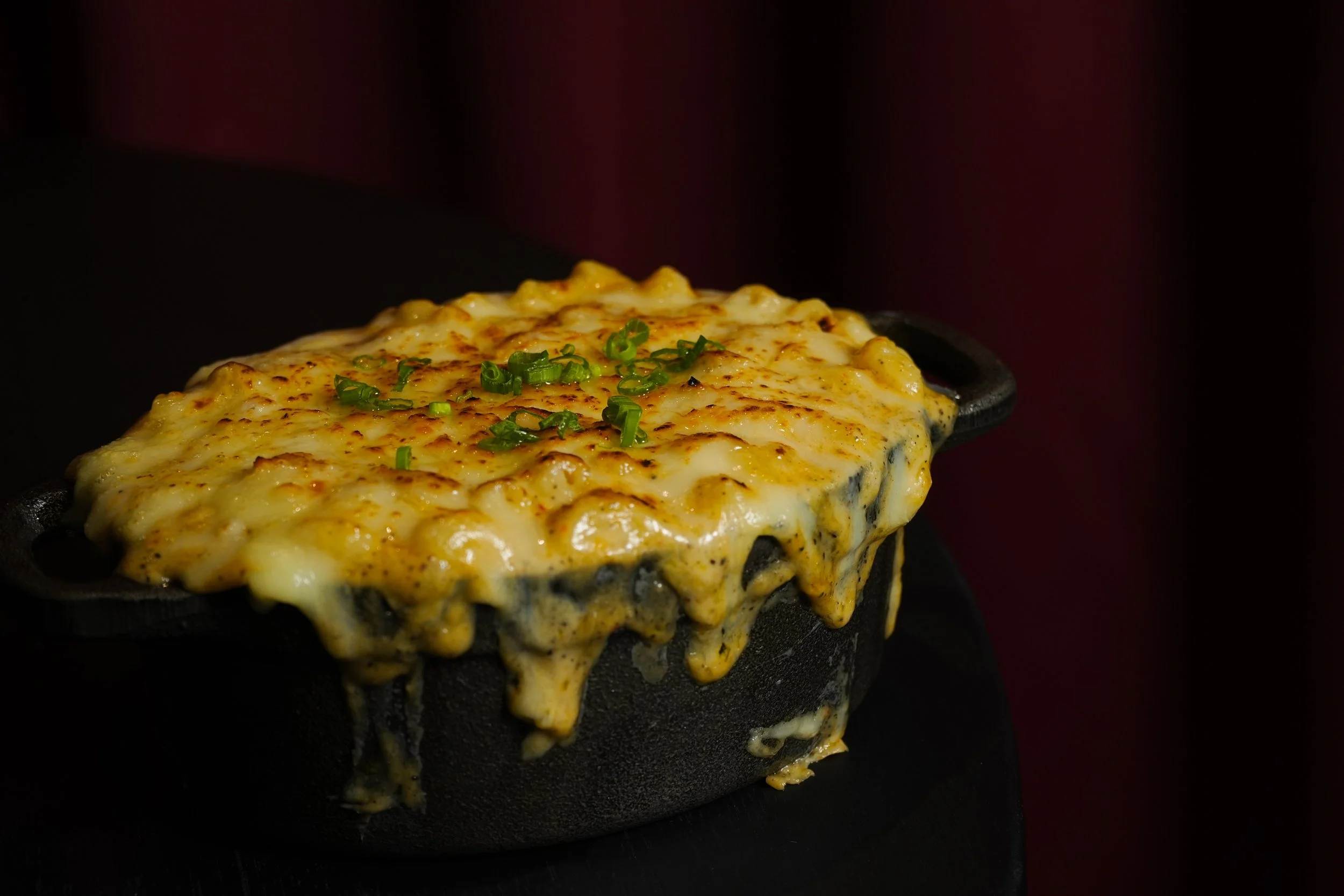 A martini cocktail with olives