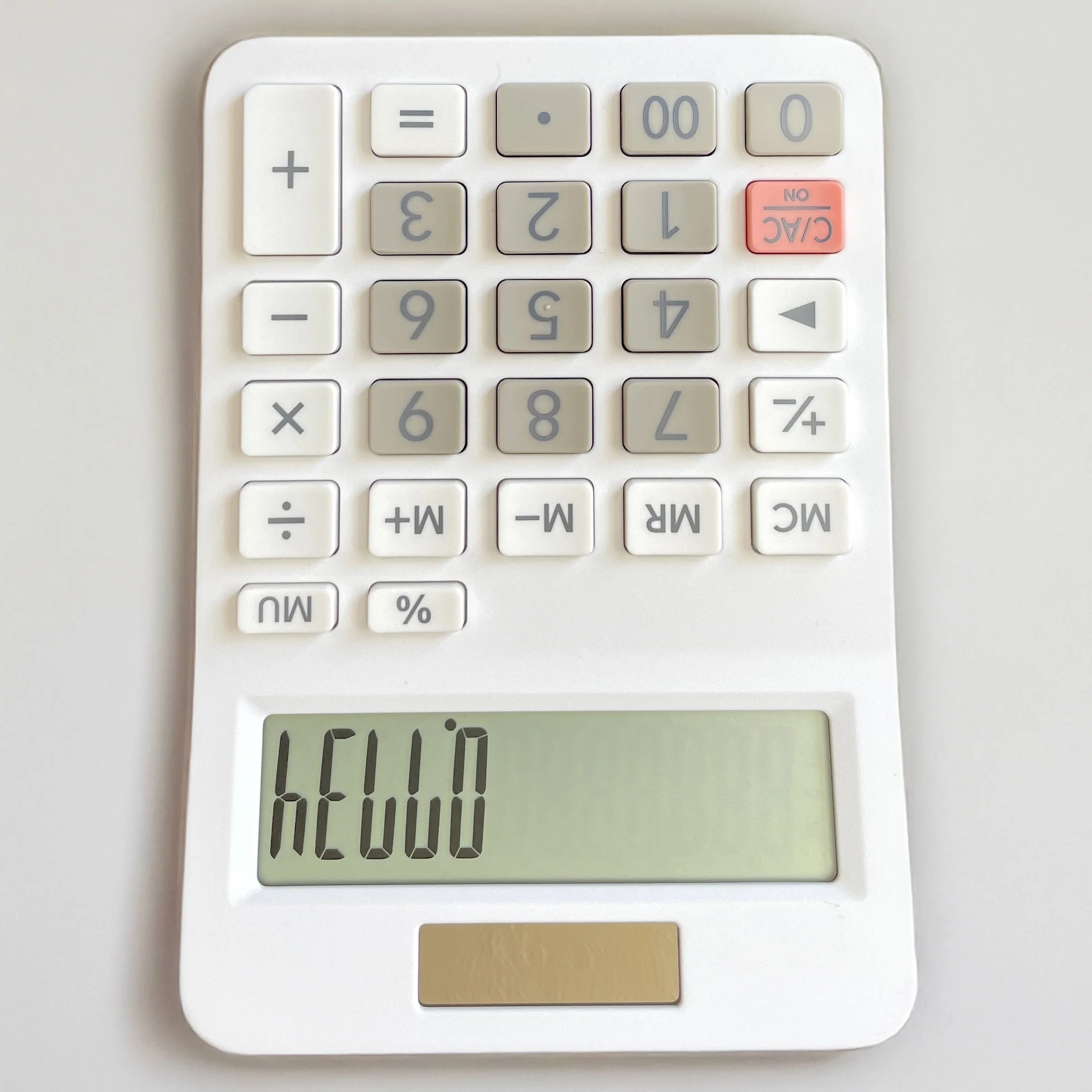An upside down calculator that says "Hello" (0.7734)