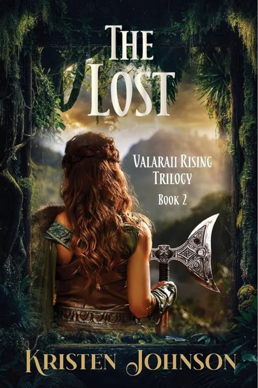 Book cover titled "The Lost" by Kristen Johnson, part of the Valarai Rising Trilogy, Book 2. Features a woman with long, curly hair holding a Viking-style axe, standing in a lush forest with mountains in the distance.