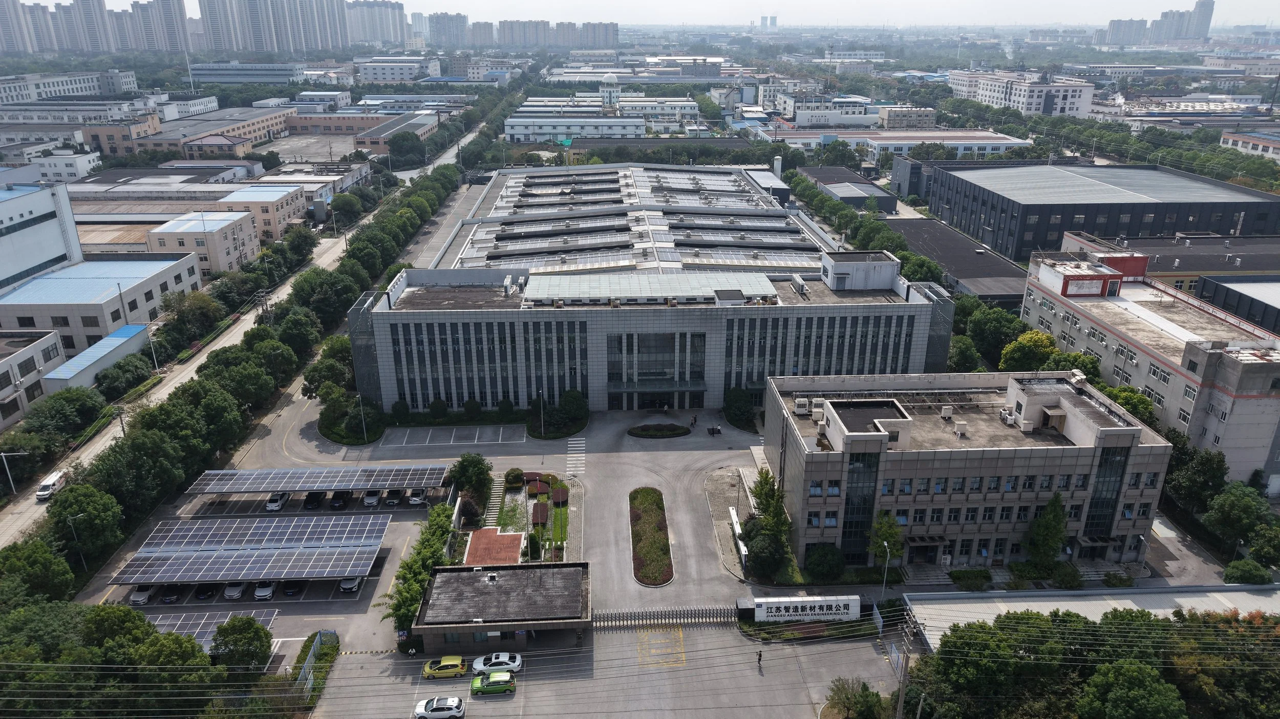 Concrete frame with steel roofing system