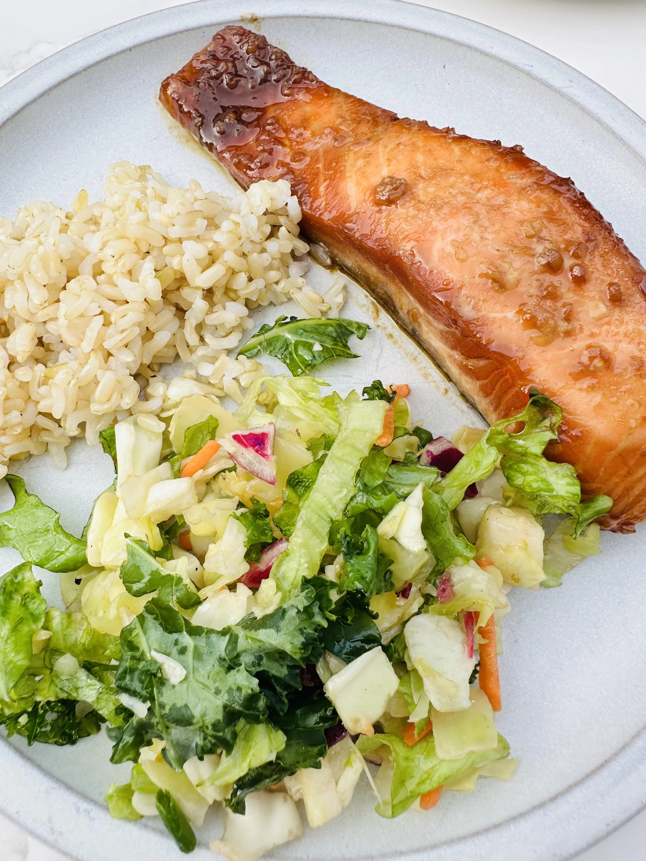 maple soy salmon with rice and salad