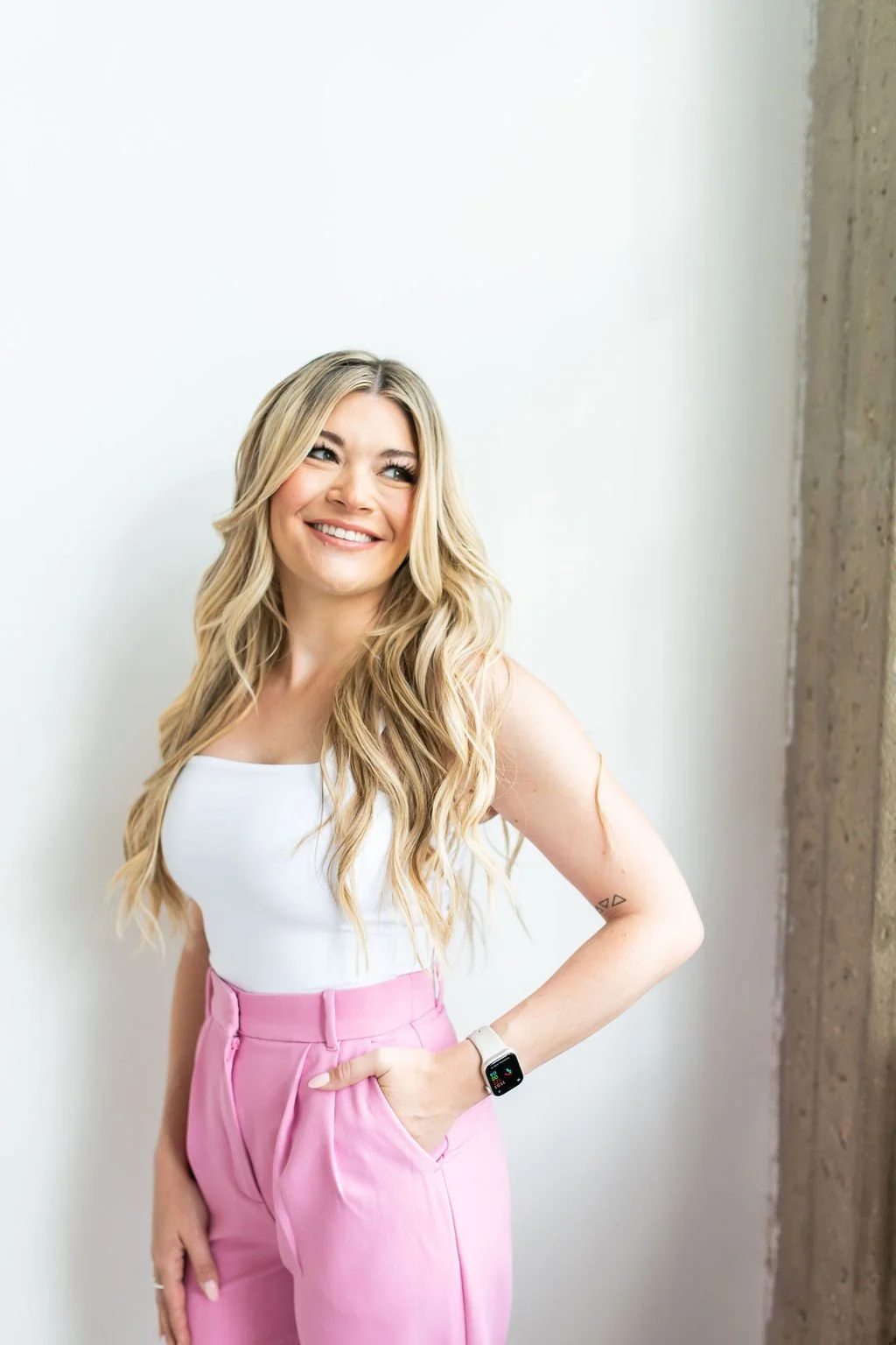 Haley smiling and looking off to the side