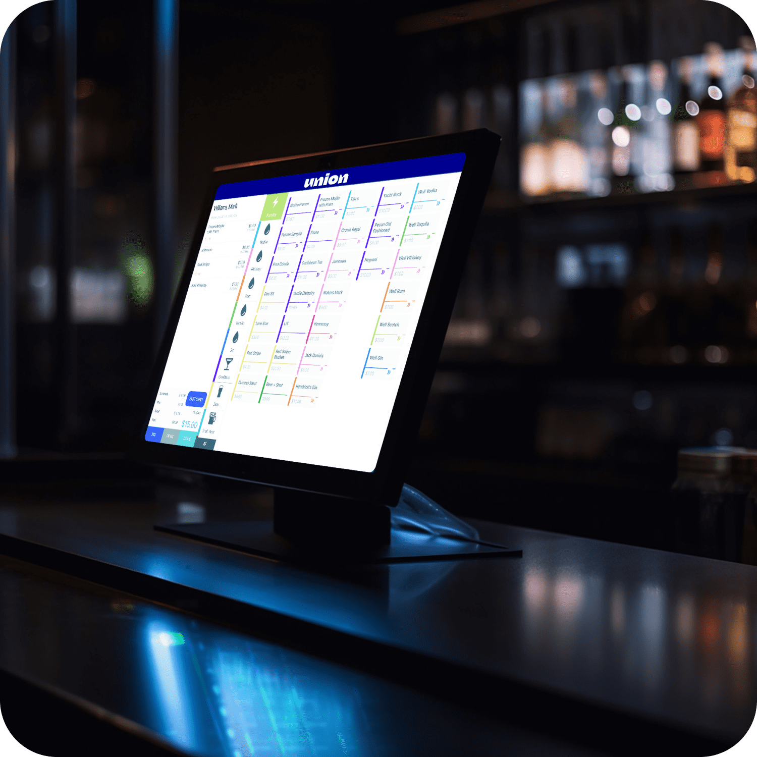 Touchscreen point-of-sale system displaying a colorful drinks menu in a bar or restaurant setting.