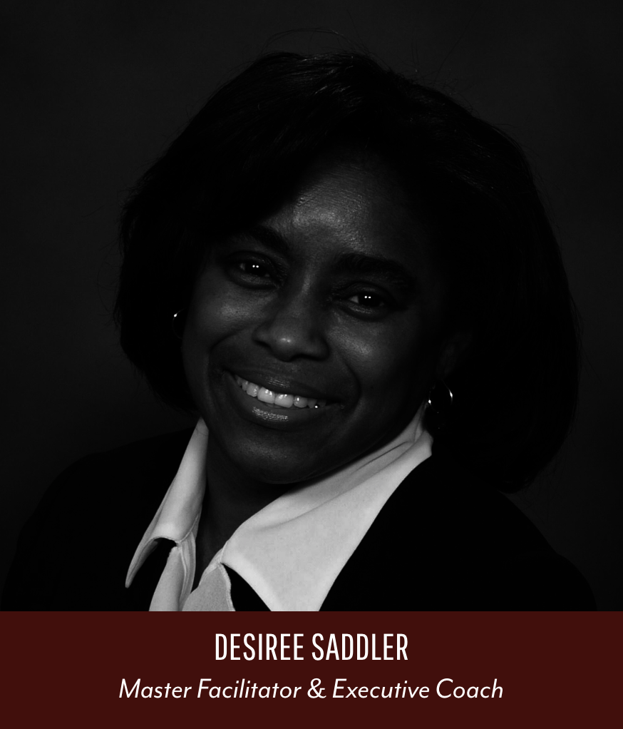 A black and white professional portrait of Desiree Saddler, smiling, with dark hair and wearing a suit and a white shirt. Text overlaying the image identifies her as a Master Facilitator and Executive Coach.