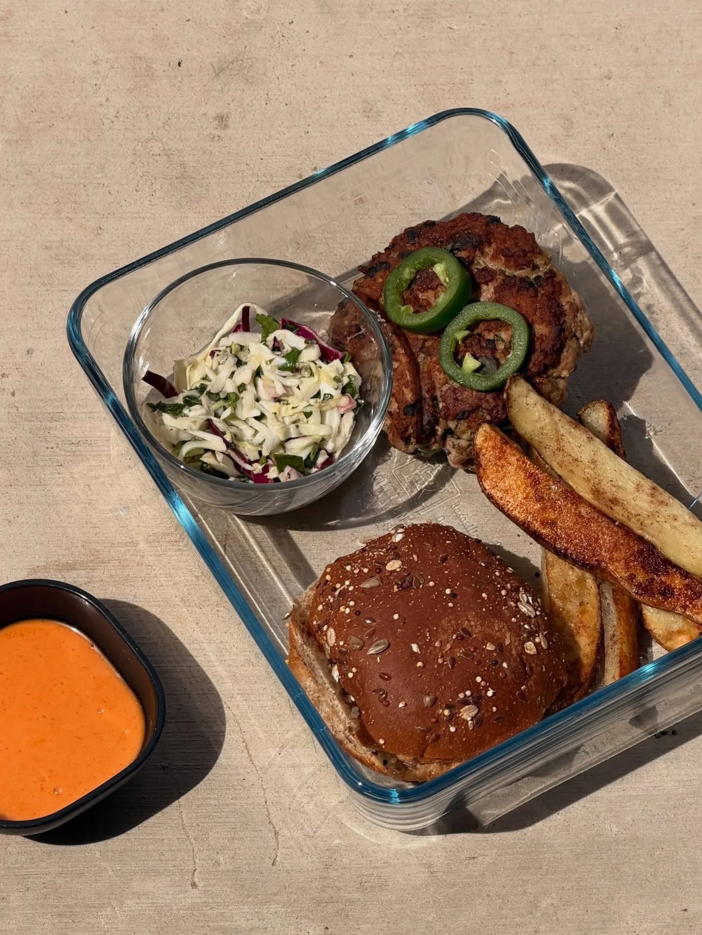 which one are you bringing to the office?👀 

1) bang bang pork burgers with 5 spice fries 

2) caprese stuffed chicken breast with garlic bread and squash medley 

3) zataar meatballs with rice and green tahini sauce 

4) ginger lime salmon with pot
