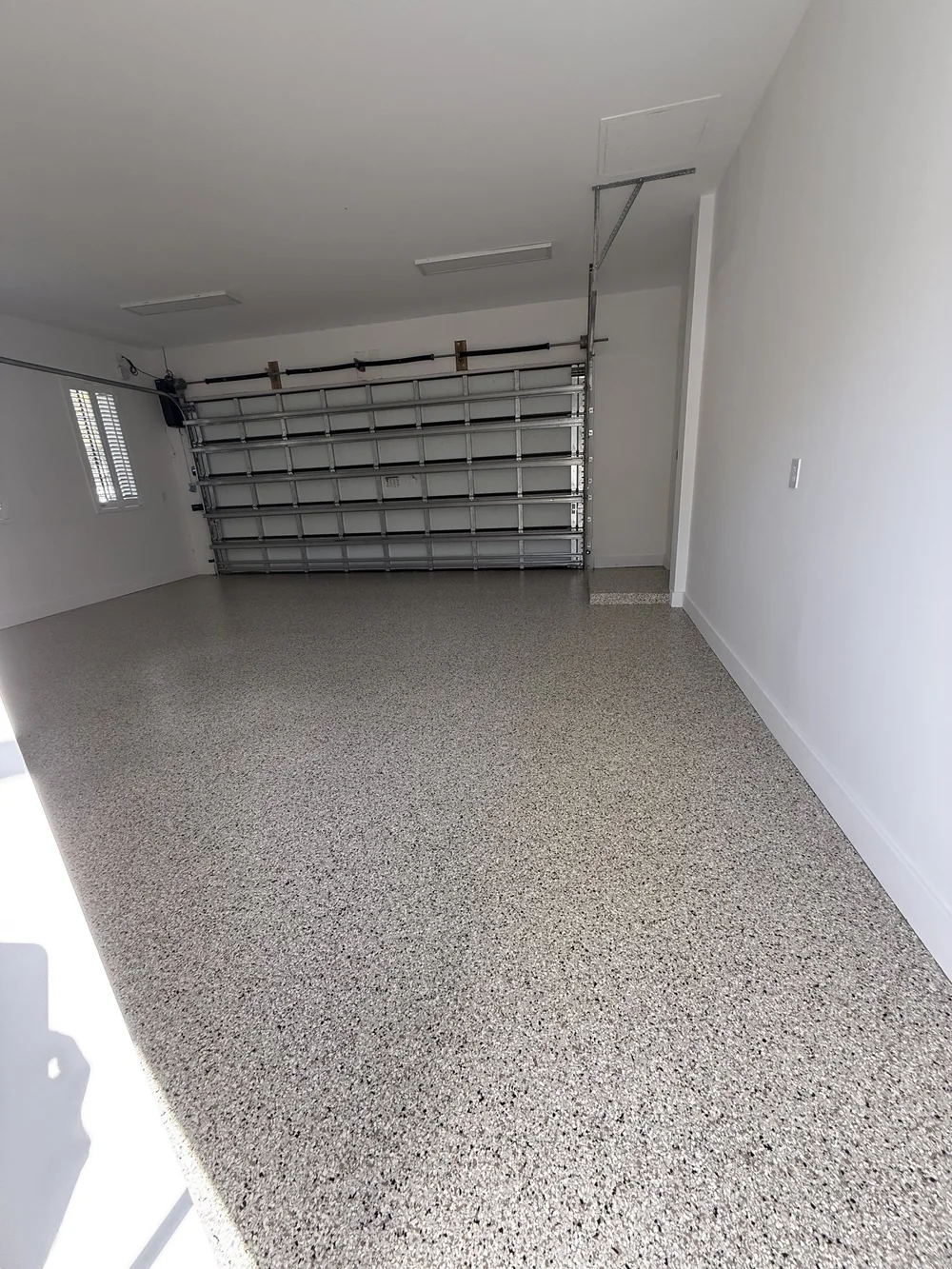 Speckled epoxy garage floor