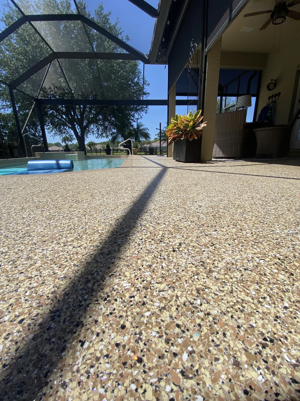 Coated pool deck and lounge area