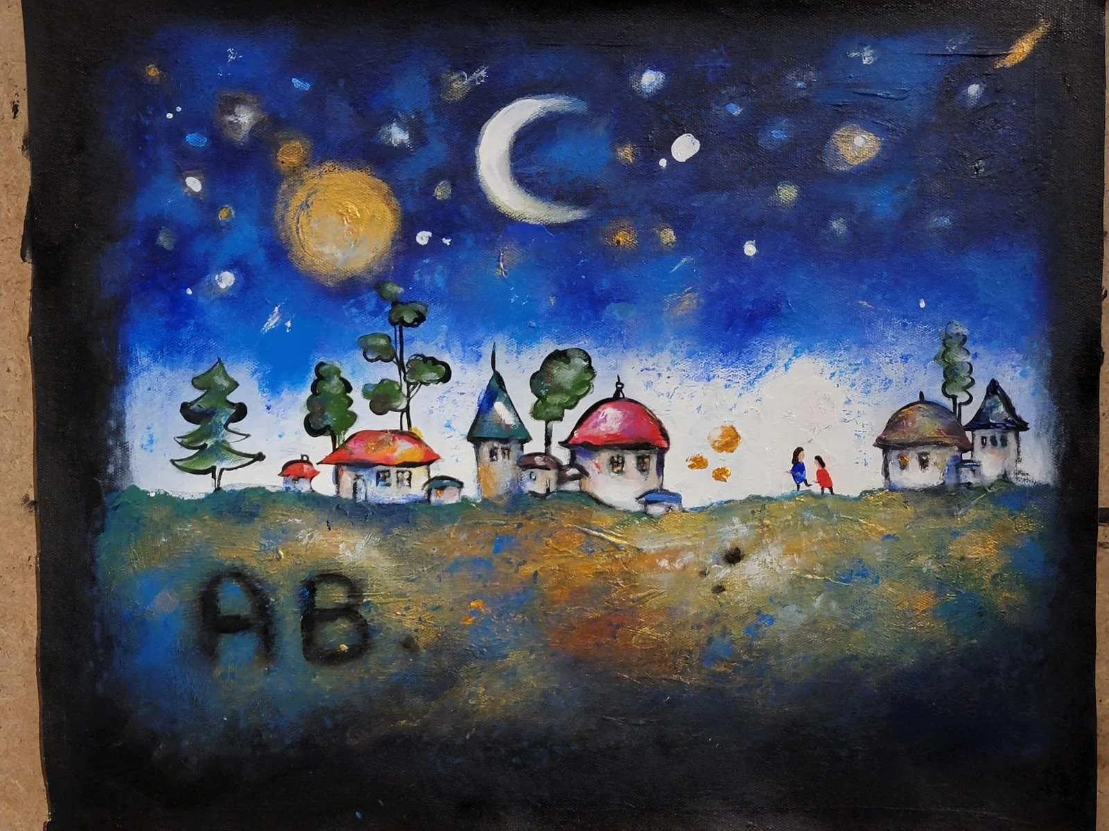 A nighttime scene of a small village with houses