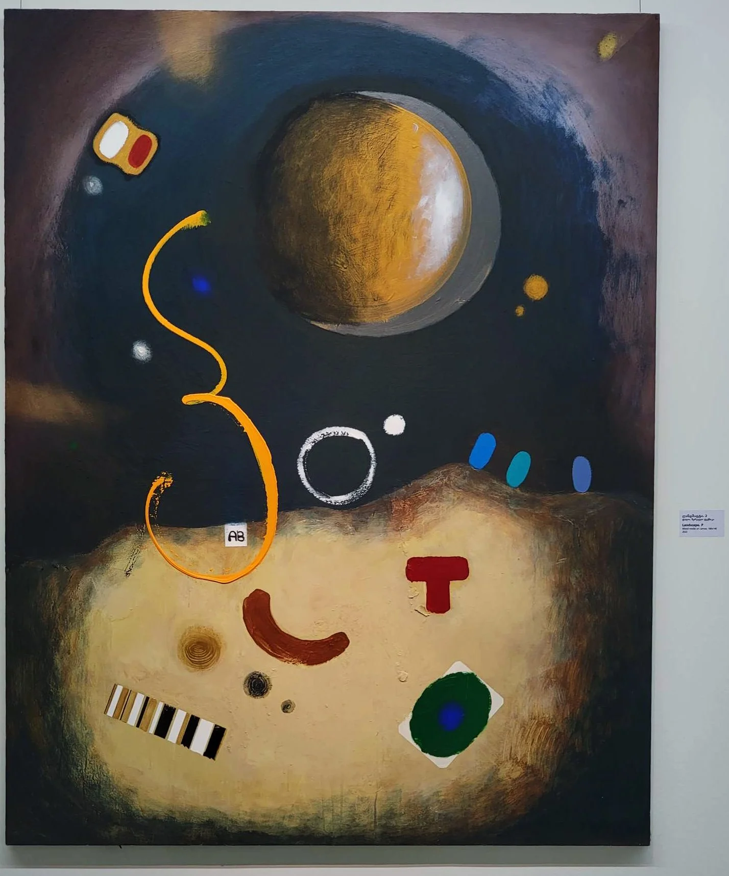 Abstract painting with a large moon or planetary body in the upper center, colorful shapes, lines, and circles on a dark background, and earth-toned areas at the bottom, resembling a surreal or cosmic scene.