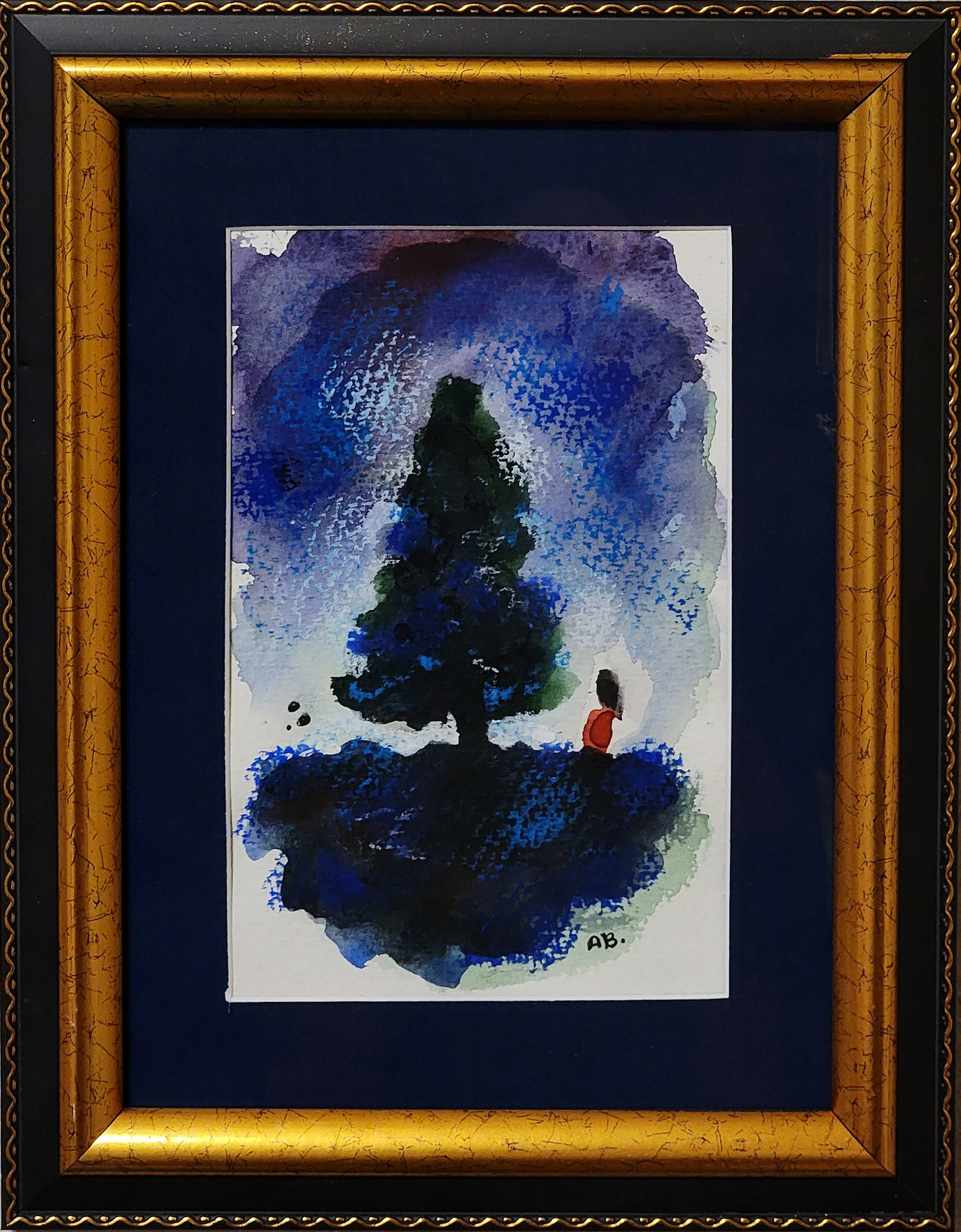 Watercolor painting of a person sitting on the ground beside a large tree, with a night sky in shades of blue and purple in the background. The painting is framed with a decorative gold and black frame.