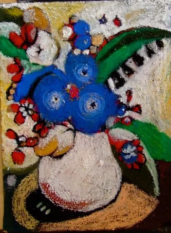 Colorful still life painting of a blue flower bouquet in a white vase with green leaves and red accents, on a brown surface.