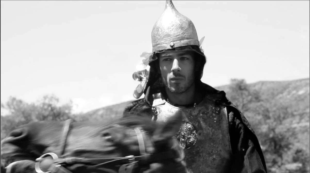 Artist Giorgi Vefkhvadze portrays the knight who speaks the film’s defining words: "There is a truth that no one needs".