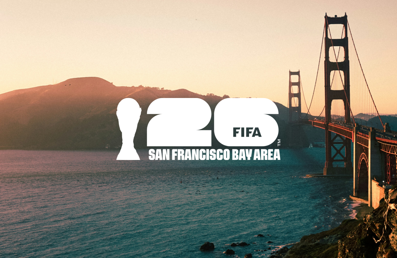 Sunset view of the Golden Gate Bridge over the water with hills in the background, emphasizing the San Francisco Bay Area.