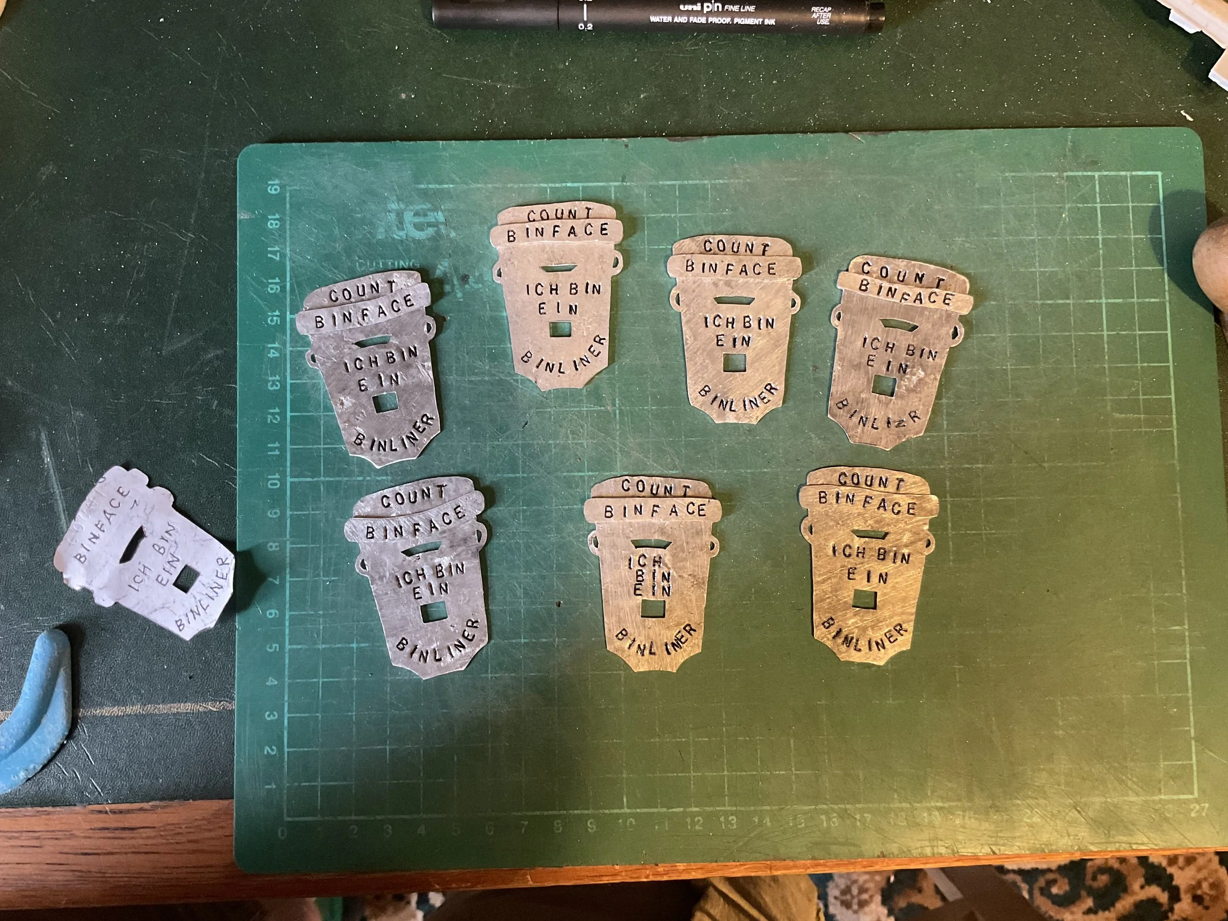 Using fine tipped marker pen to fill in the letters and thus make them stand out more.