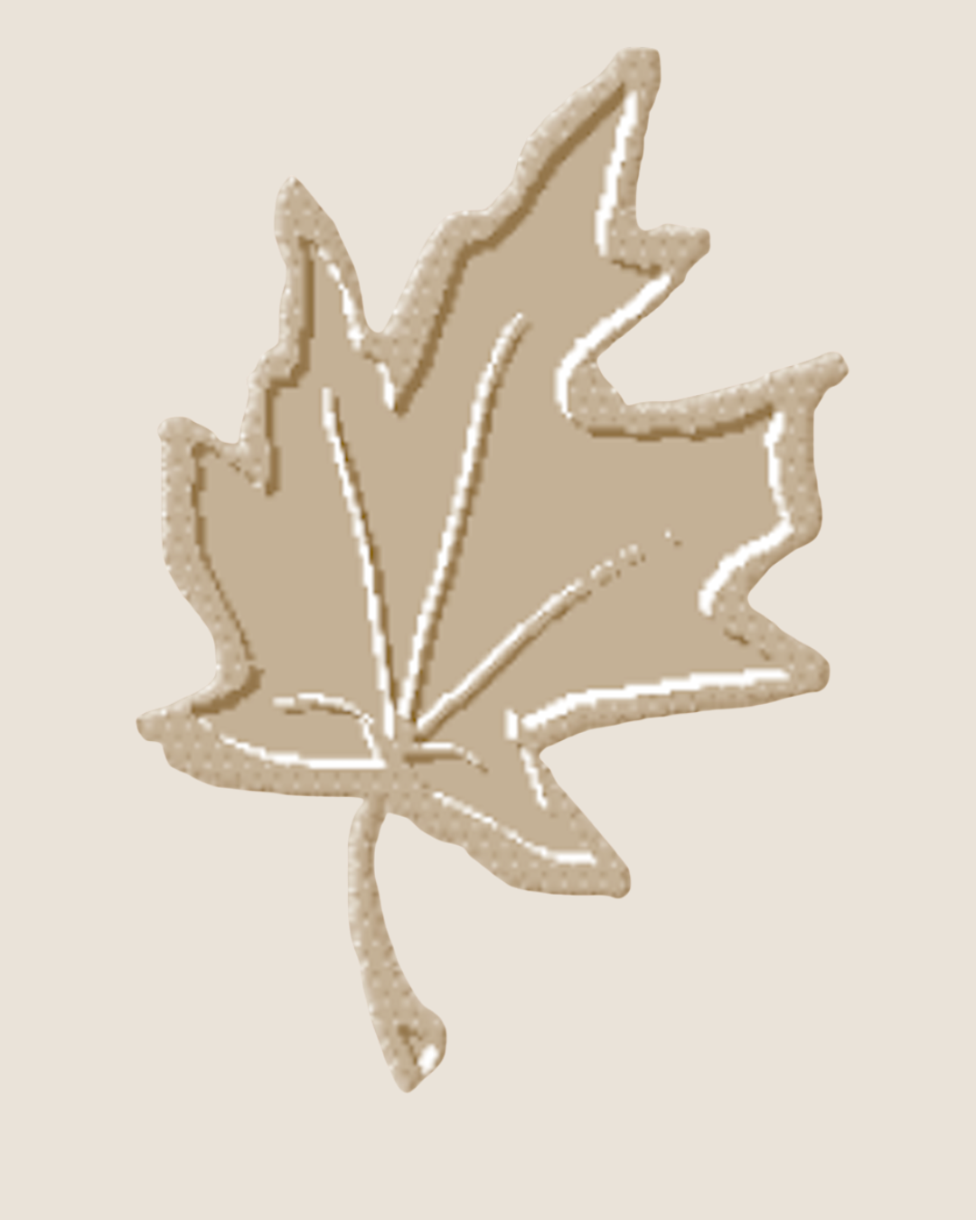 A beige-colored, stylized maple leaf with a textured appearance on a light background.
