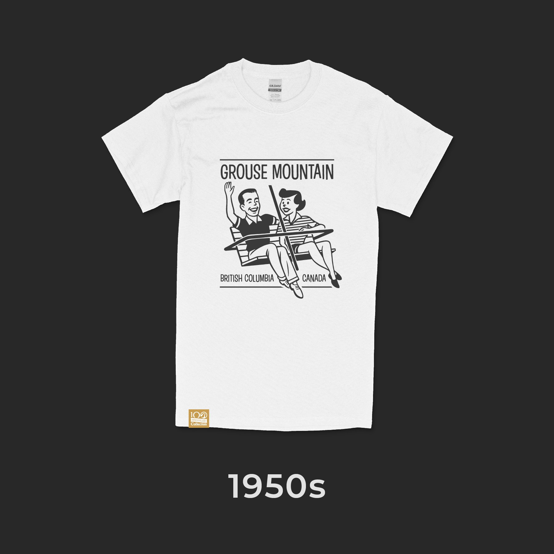 White T-shirt featuring a vintage 1950s cartoon illustration of a man and woman on a gondola, with the words 'Grouse Mountain' above the image and 'British Columbia' and 'Canada' below. The shirt has a small logo at the bottom left corner.