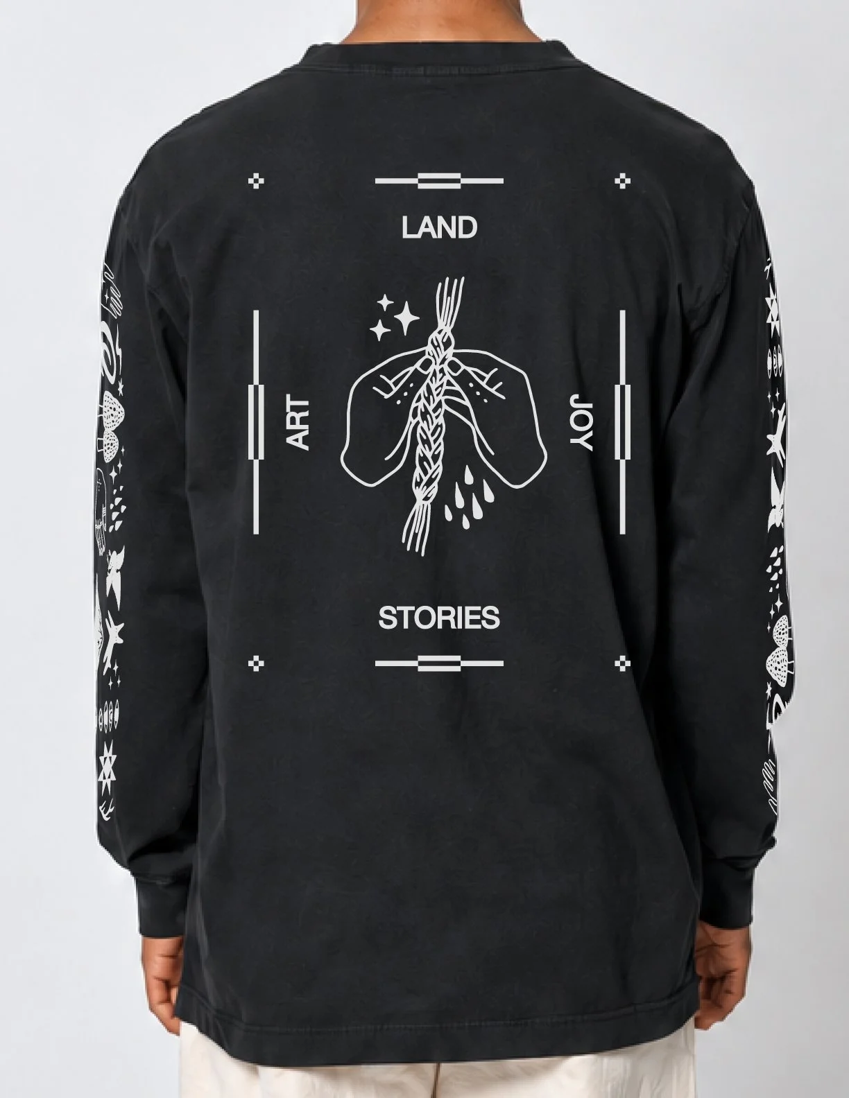 IndigenousCreatives_Apparel_Mockup_LongSleeveTee_Black_Sweetgrass_Back.jpg