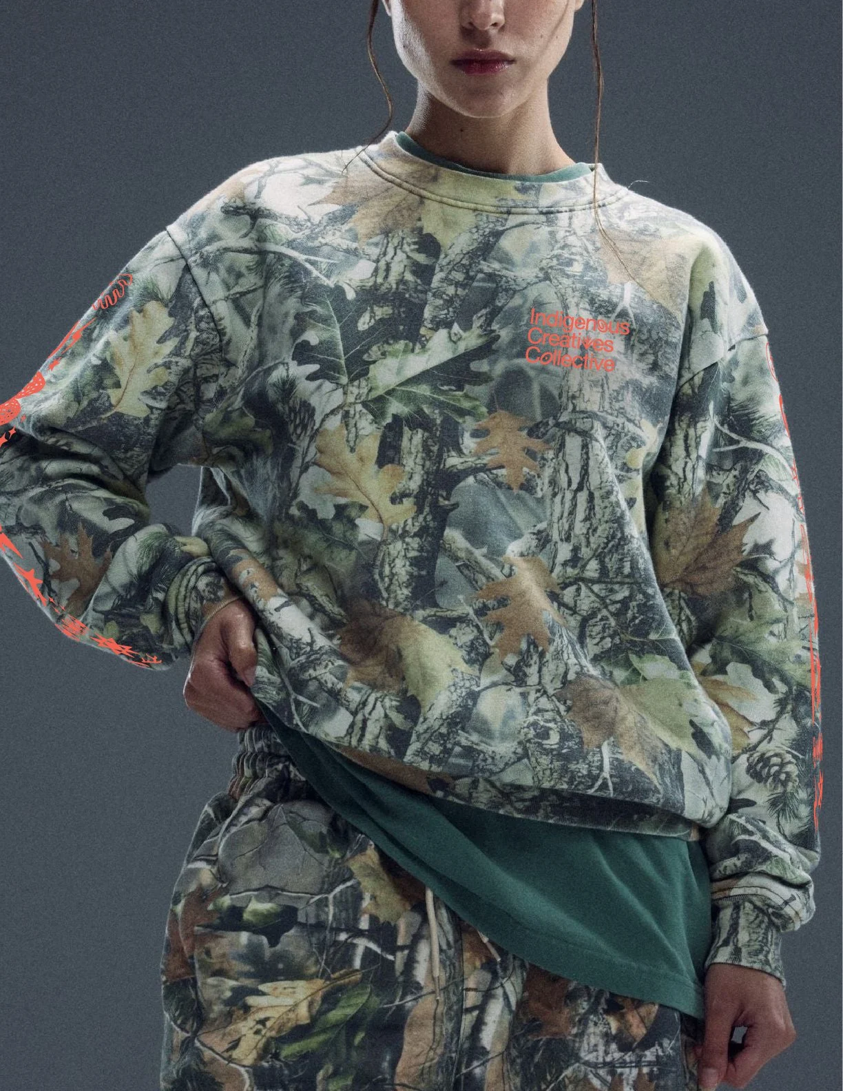 IndigenousCreatives_Apparel_Mockup_Camo_Sweatshirt_Front2.jpg