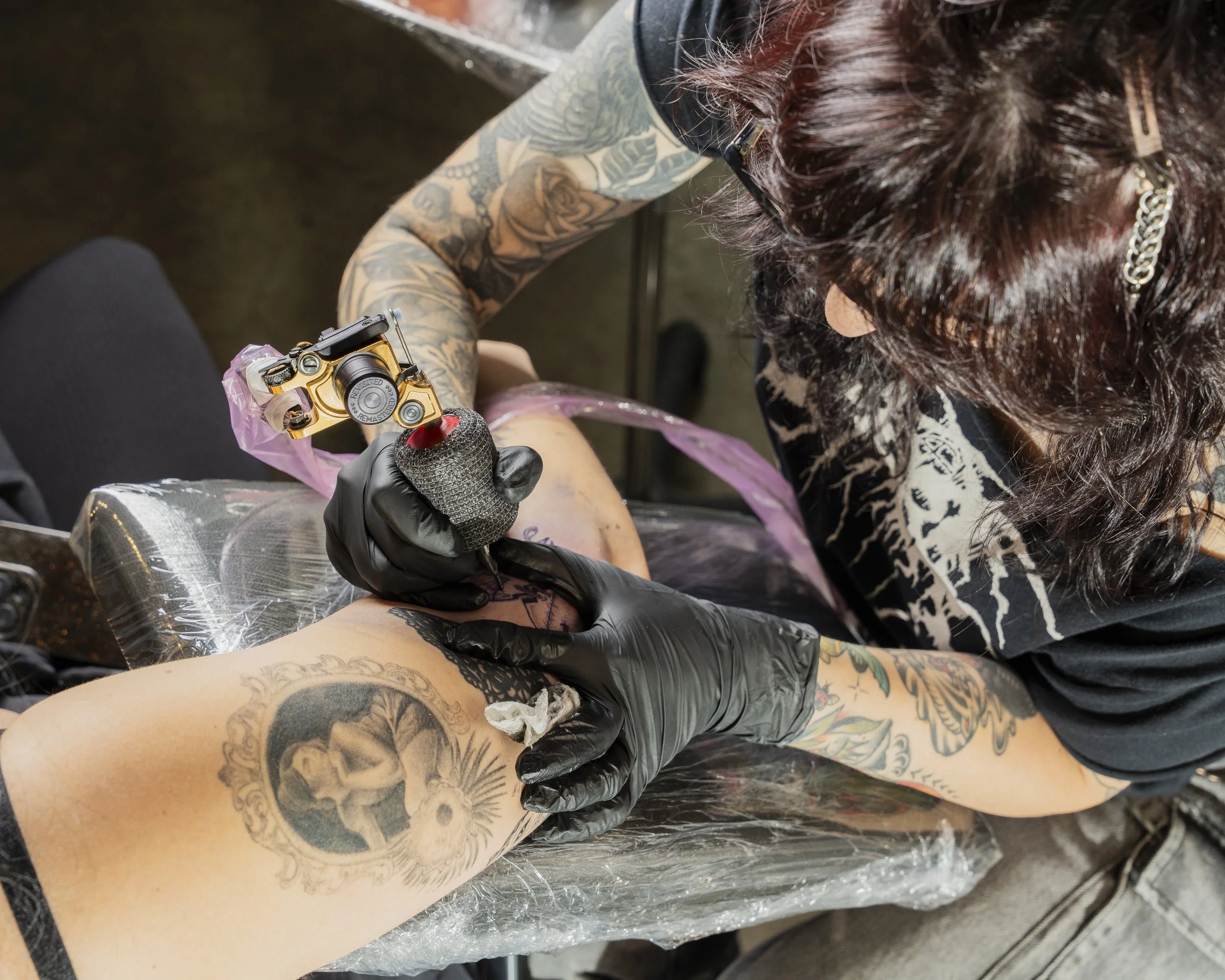 Female Tattoo Artist woman owned tattoo shop