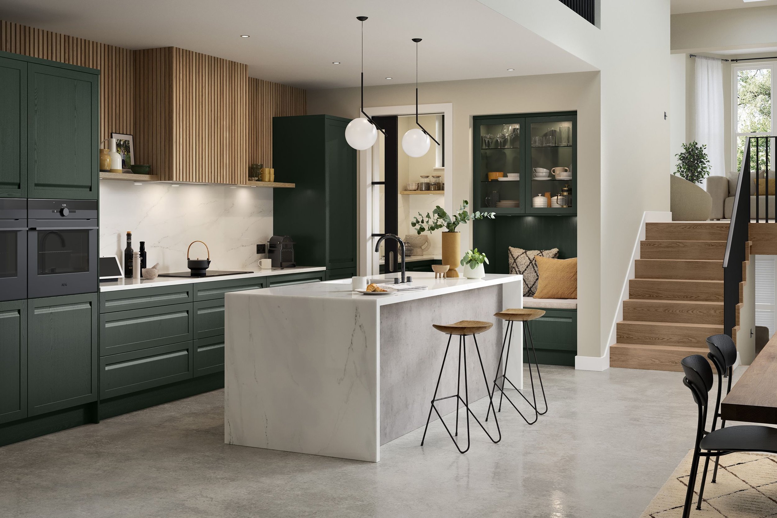 Modern kitchen with green cabinets, white marble backsplash, white marble island with black faucet, wooden bar stools, pendant lights, built-in seating nook with cushions, staircase with wooden steps, and a dining area with black chairs.