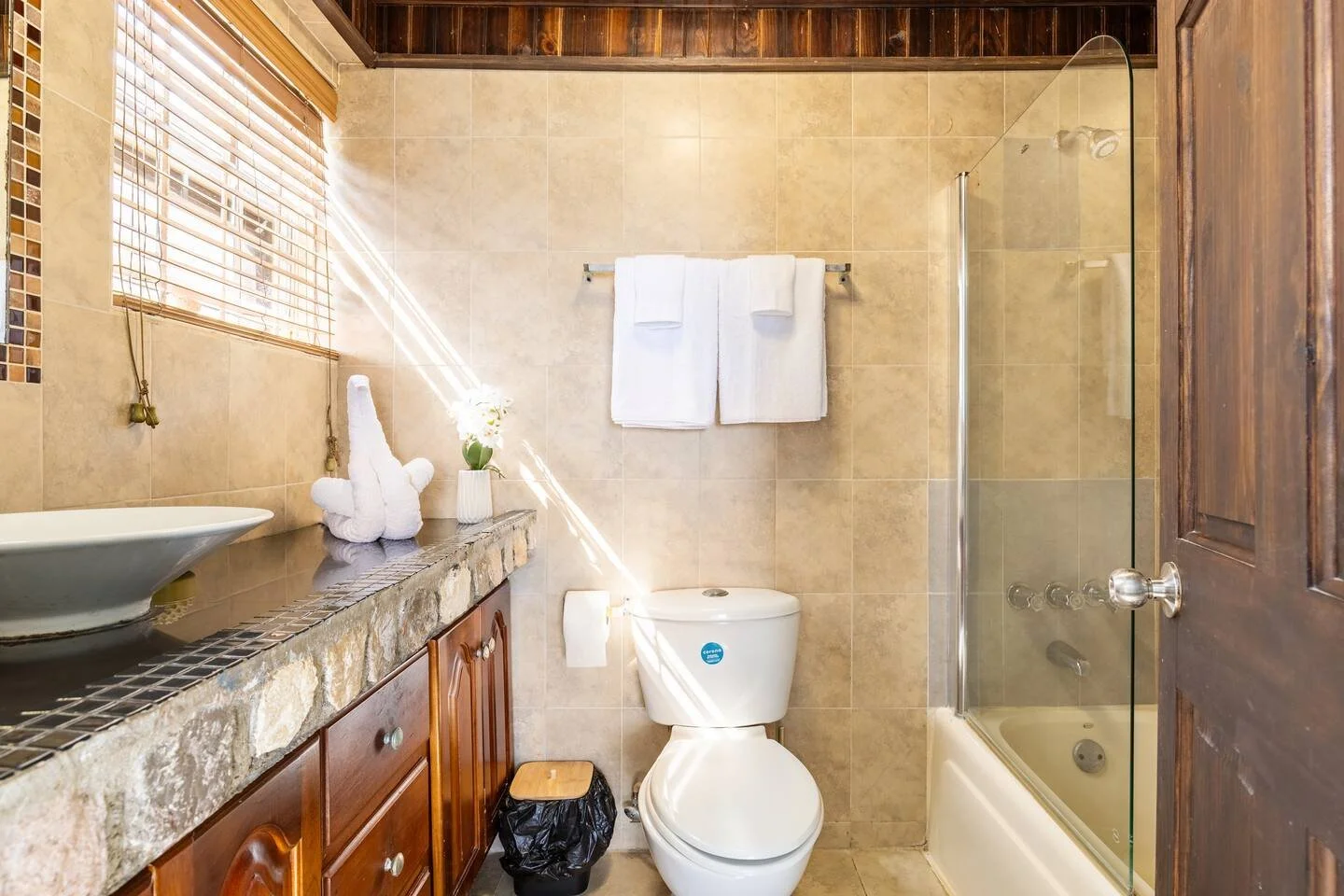 Modern Bathroom with vanity and glass door shower.