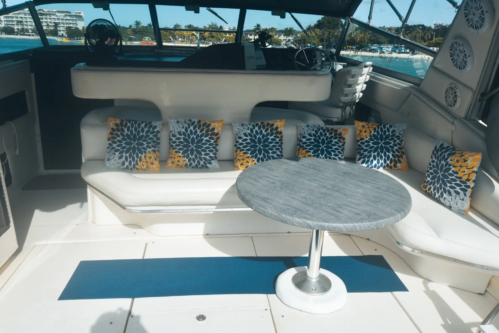 Luxury Yacht interior with cushioned seating and oceanviews