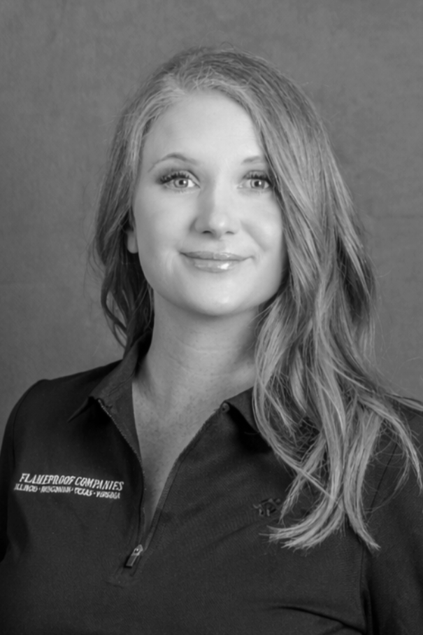 Man sitting on a bench against a beige wall, looking to the left