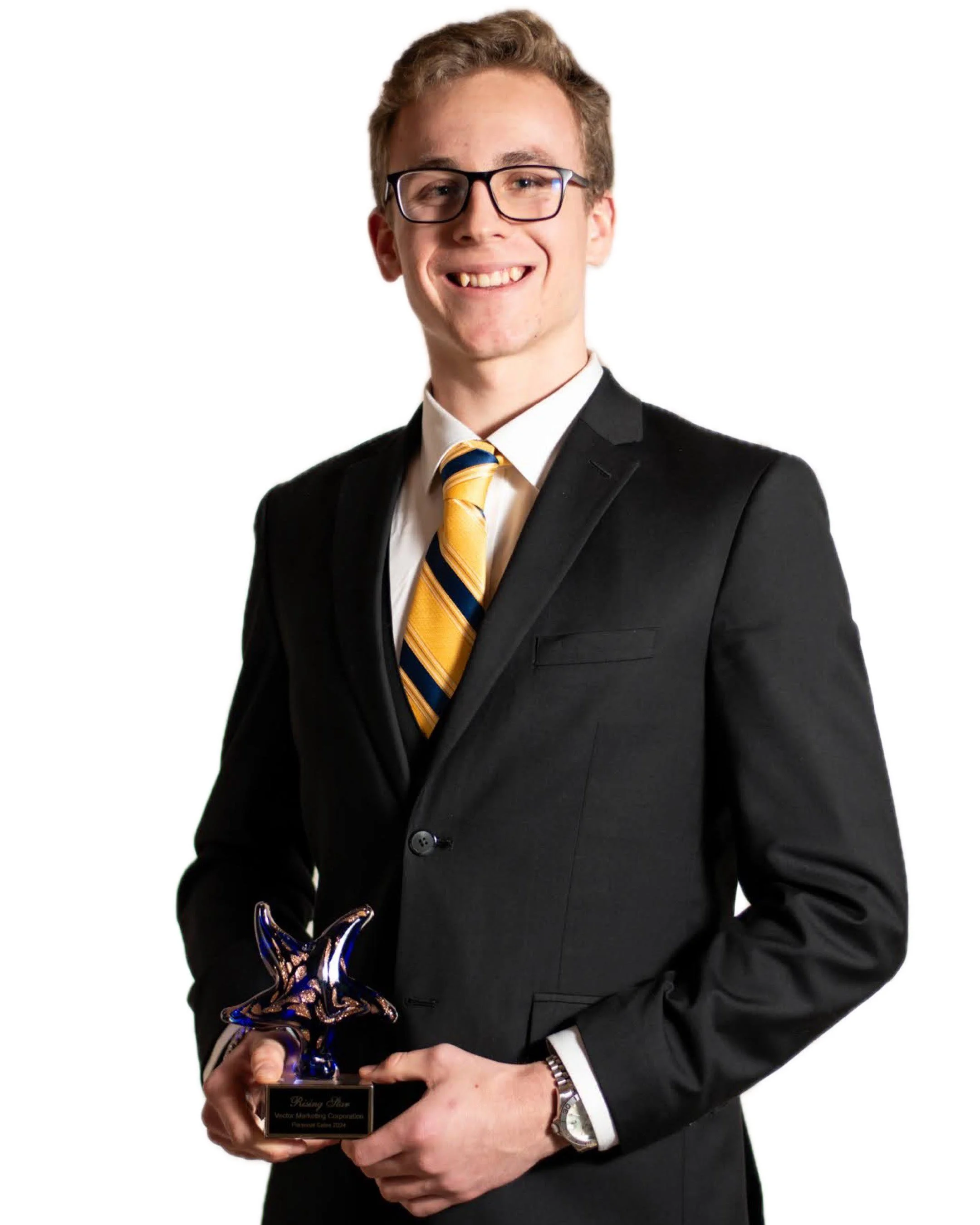 young smiling man with glasses wearing a black suit