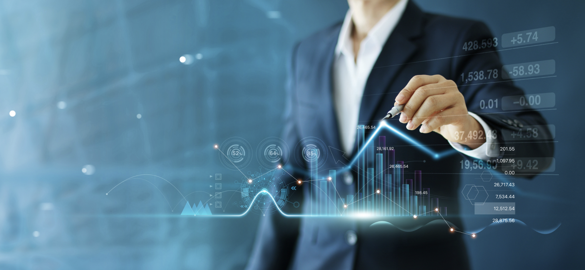 A person in a business suit interacting with a digital financial graph and data visualization.