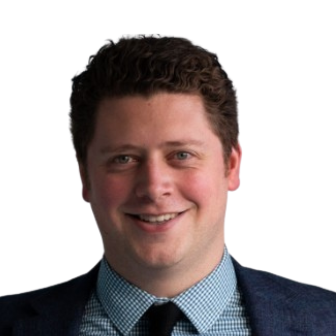 Headshot of a young professional with brown hair smiling