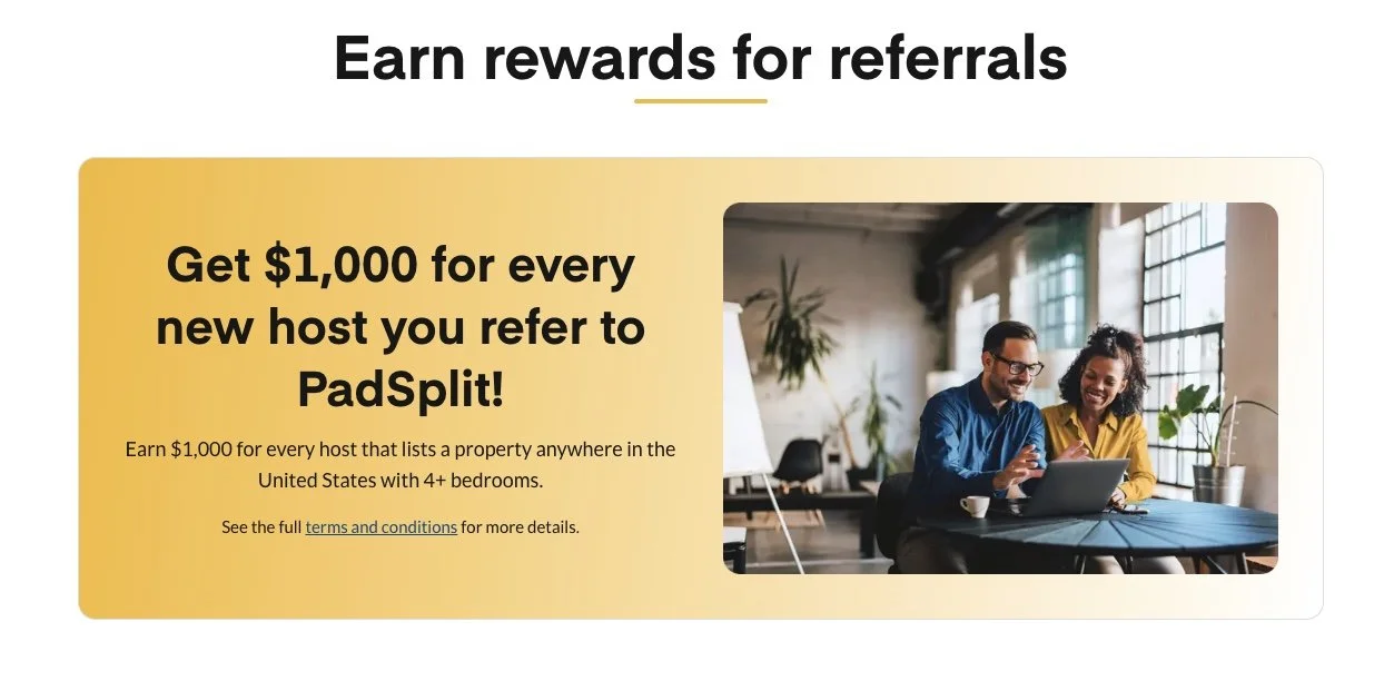 A promotional webpage offering $1,000 rewards for referring new hosts to PadSplit, featuring a photo of a man and woman sitting at a table, looking at a laptop, inside a bright, modern office with large windows and plants.
