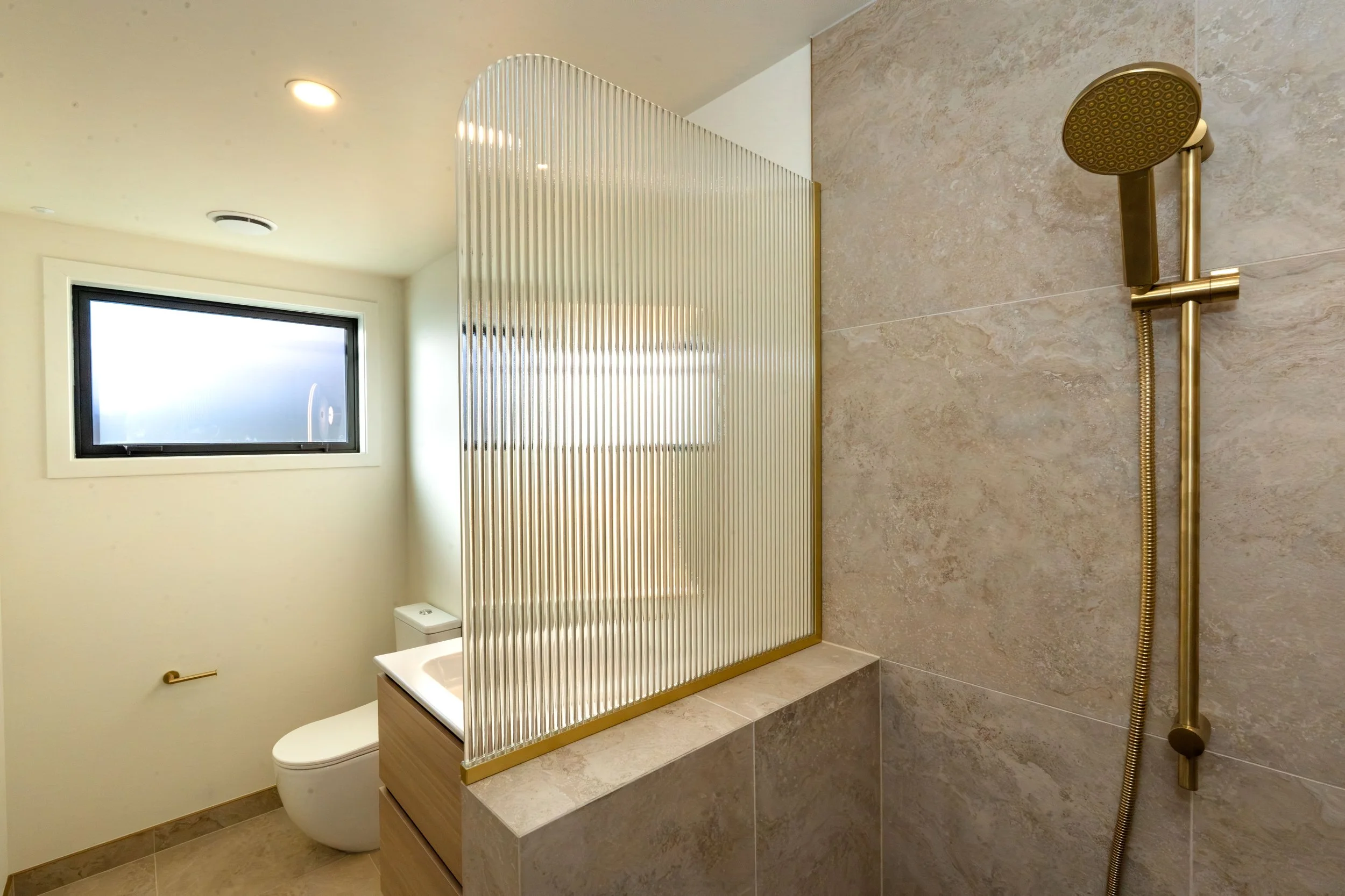 Modern master ensuite showcasing bespoke joinery, designer tapware, premium materials, and thoughtful interior design, delivering a sophisticated bathroom for everyday living.