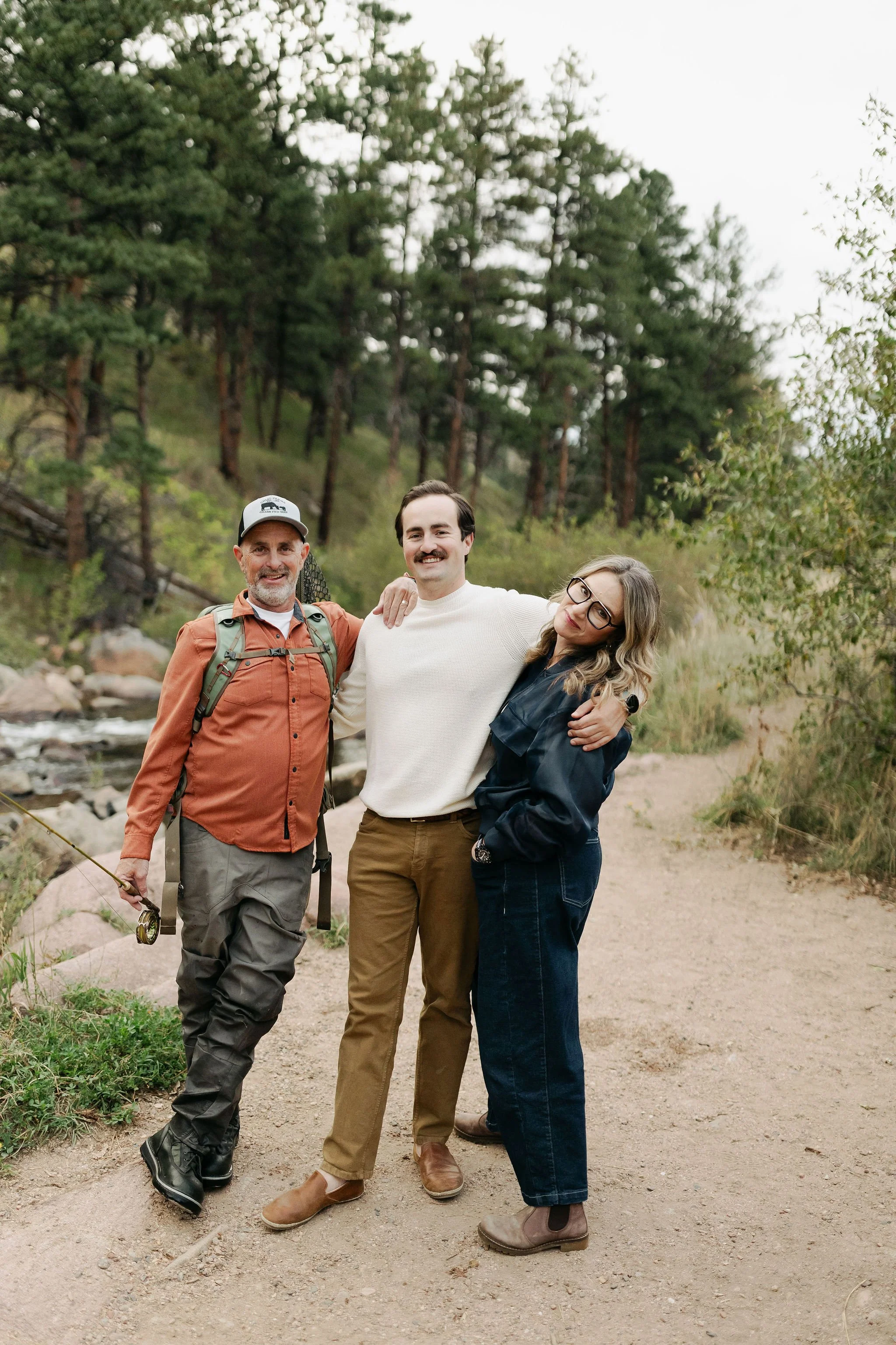Jill Krush with her family standing together outdoors near a river, reflecting the warmth, connection, and nature-centered values of Ginkgo Collective