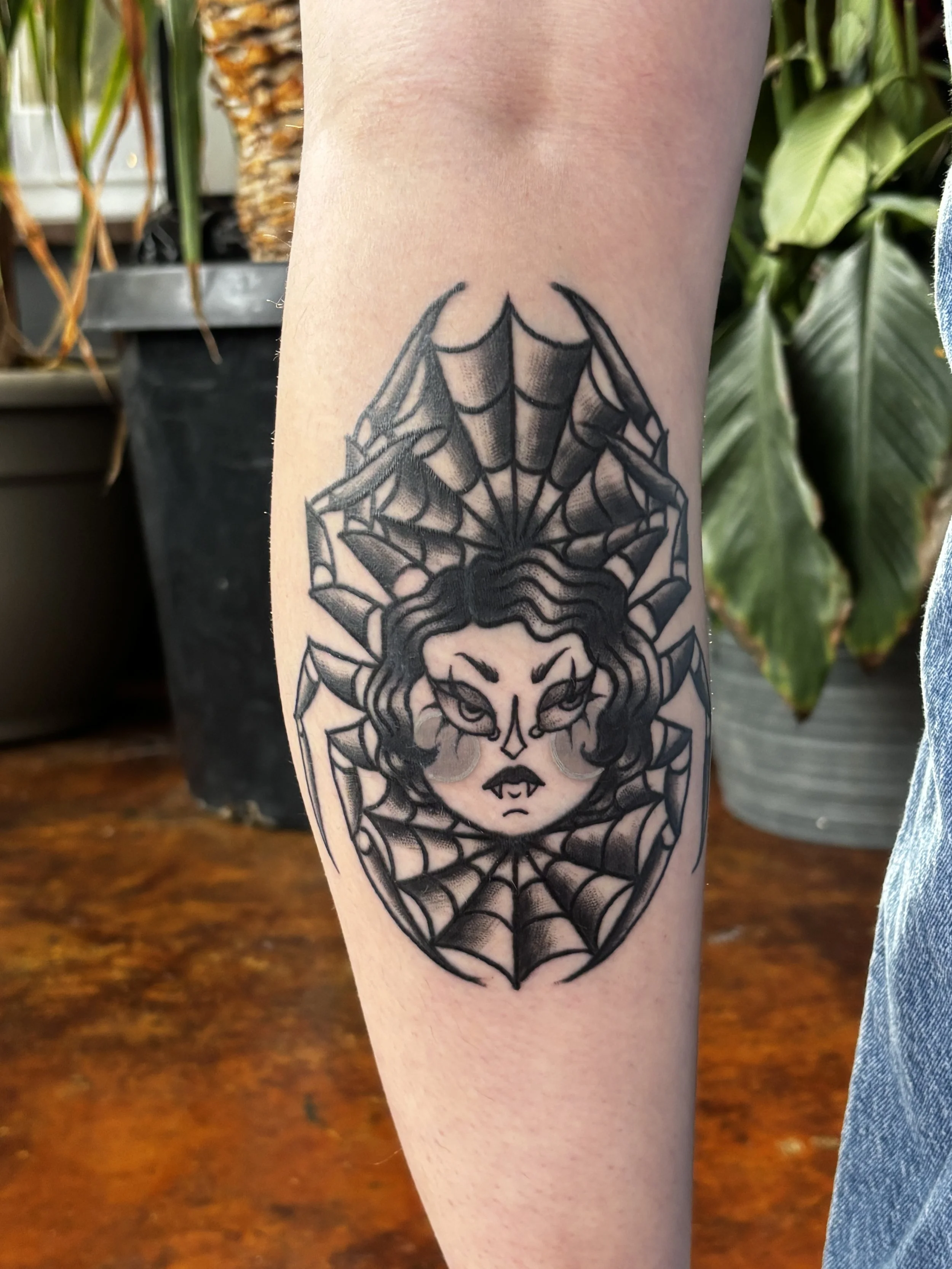 American traditional tattoo of a women as a spider done at Stag and Caste in Cincinnati, the best tattoo shop in Cincinnati