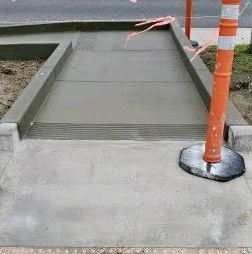 Concrete sidewalk ADA ramp