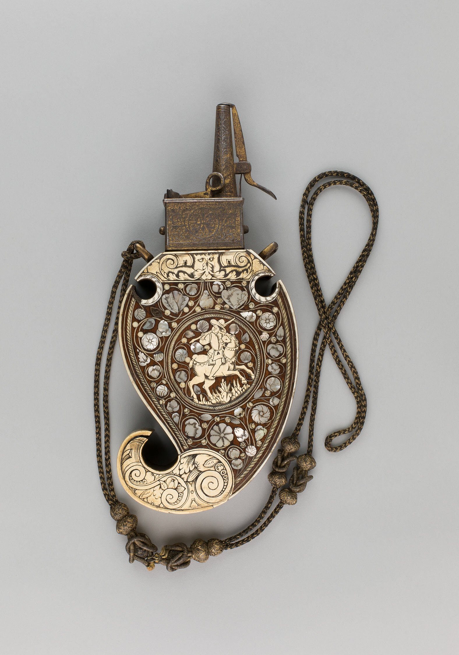Shell inlay on weaponry