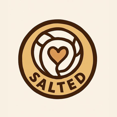Salty badge with a heart in the center and a circular border.