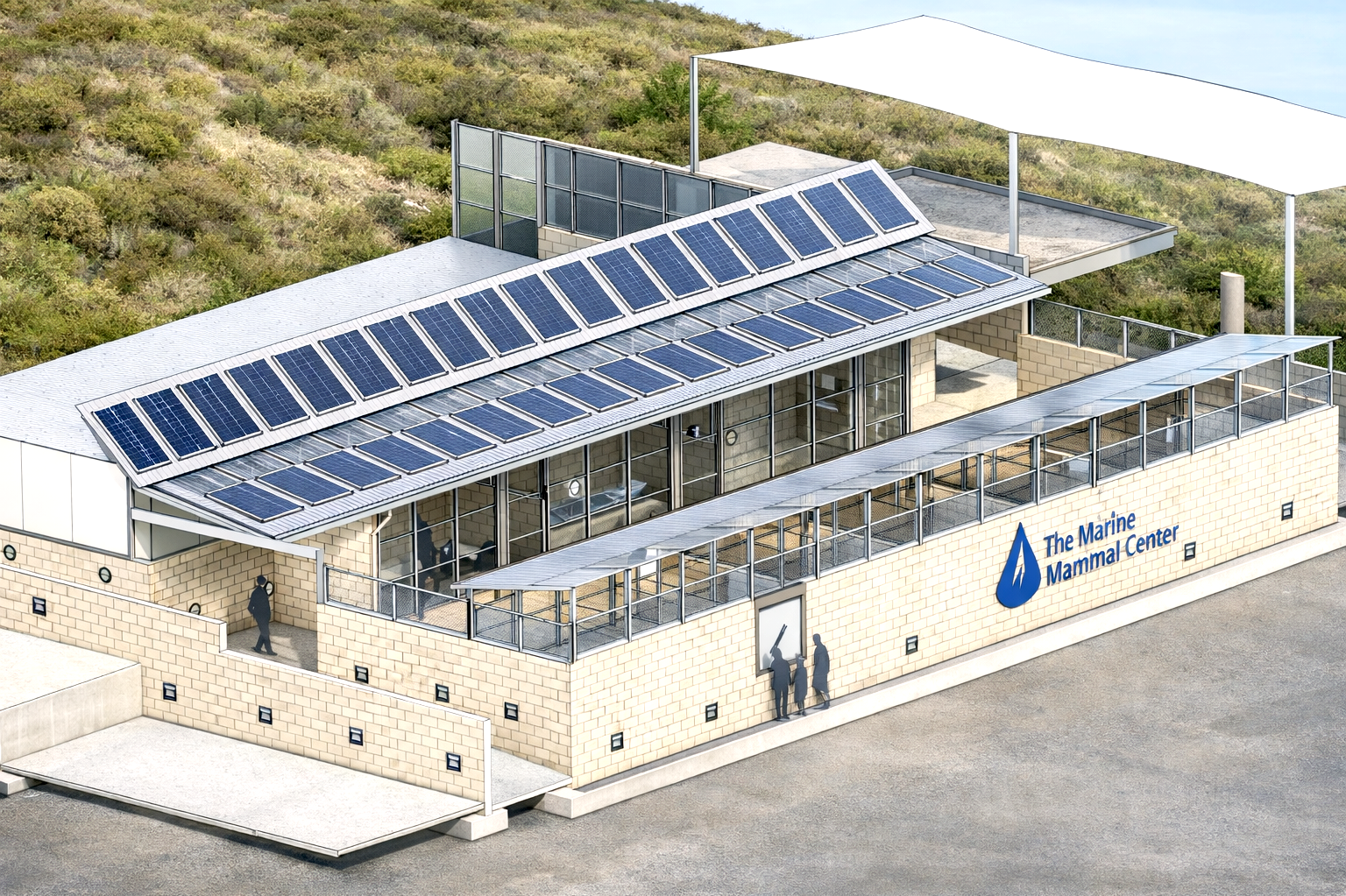 A building with solar panels on its roof, labeled 'The Marine Mammal Center', located outdoors with surrounding greenery. Structural engineering by BASE Design in San Francisco.