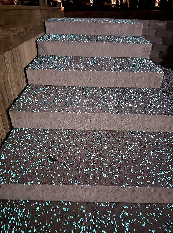 Glow in dark stairs leading to pool