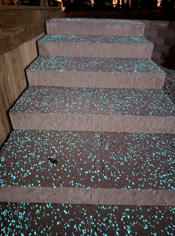 Glow in dark stairs leading to pool
